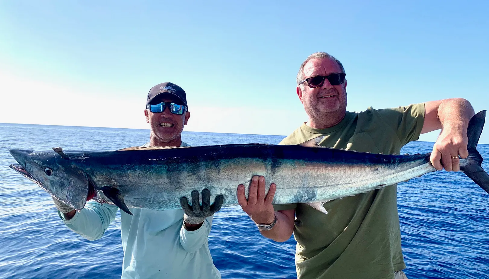 photos de pêcheurs au gros avec un gros poisson